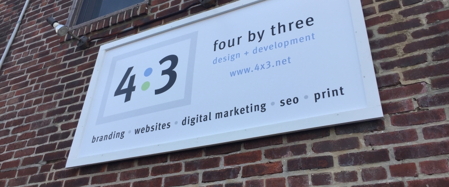 Side of 4x3 building in Bryn Mawr PA Graphic and Interactive Designer position open